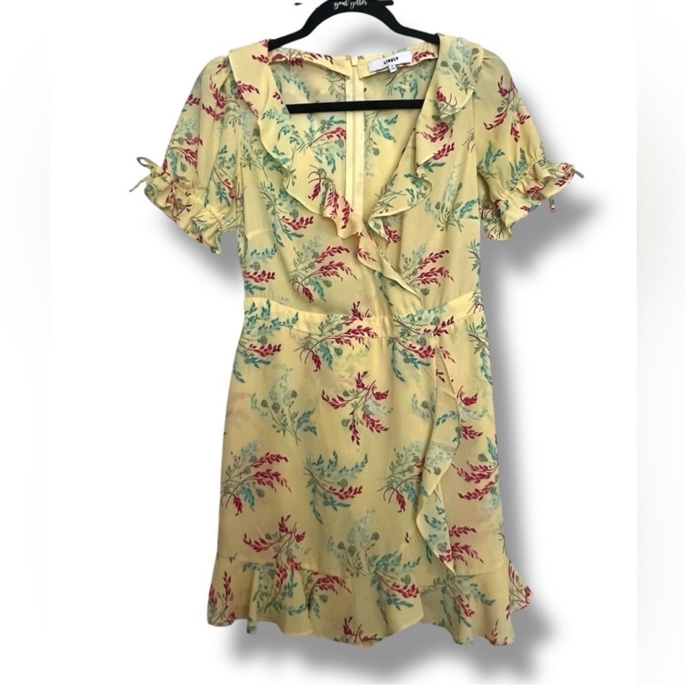 Likely Yellow Floral Ruffle Wrap Romper Size Small Like New
